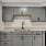 Open kitchen and living room with plenty of natural light.